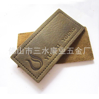 佛山市三水康業(yè)五金廠 專業(yè)提供中高檔熱壓絲印皮標皮牌，助力服裝服飾品牌升級